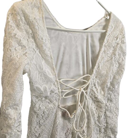 NWT Showpo Mini Lace Trim Open Tie Back White Dress Size 4 US Lace Long Sleeve - Picture 2 of 6